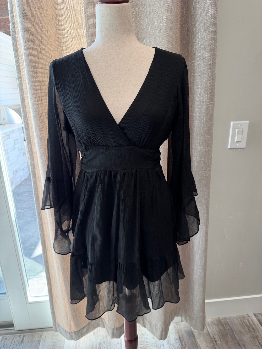 Black V‑Neck Long Sleeve Ruffle Mini Dress